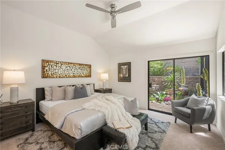 a bright primary bedroom