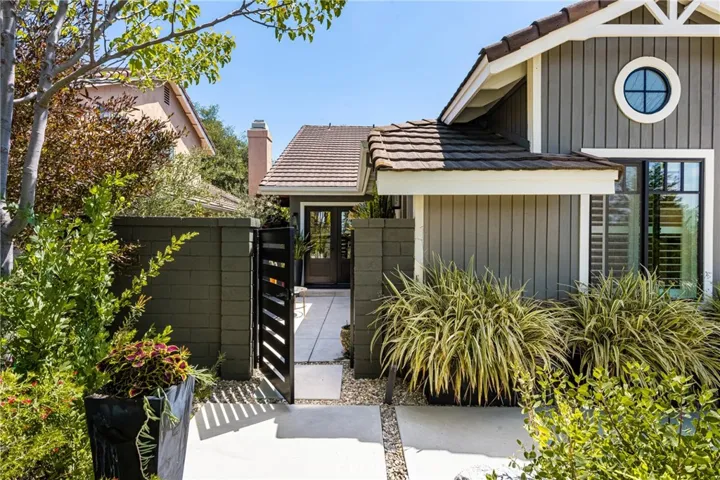tucked behind lush greenery