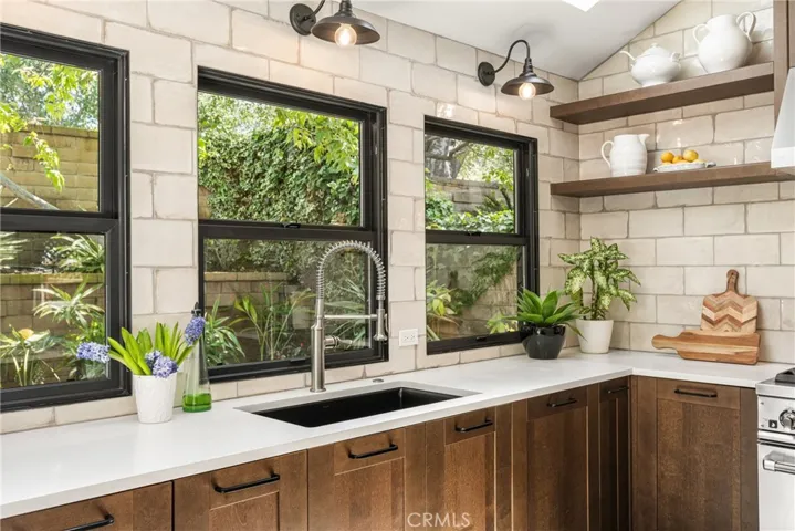 with views of the landscaped yard