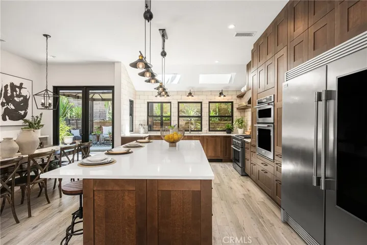 with custom, walnut cabinetry