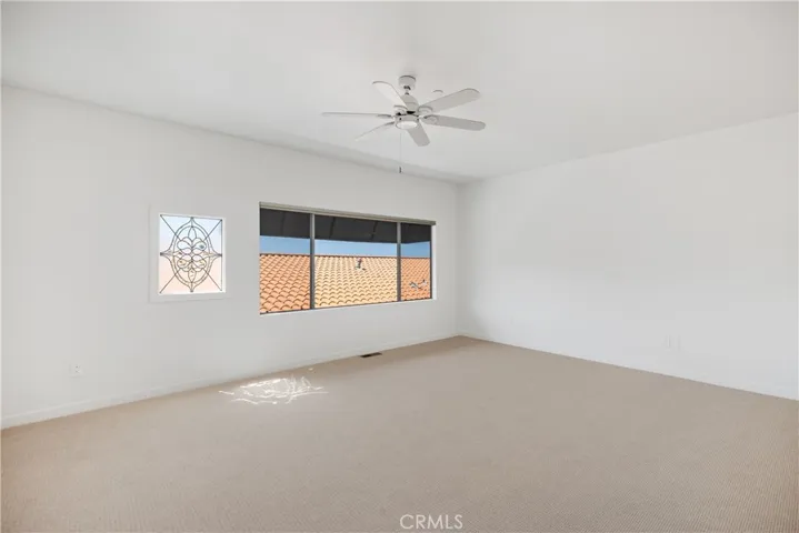 Primary bedroom  with peak ocean view