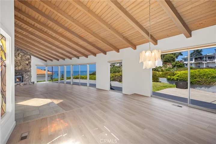 Sand blasted high vaulted wood beamed cieling