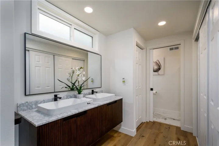 Primary bath and dual closets.