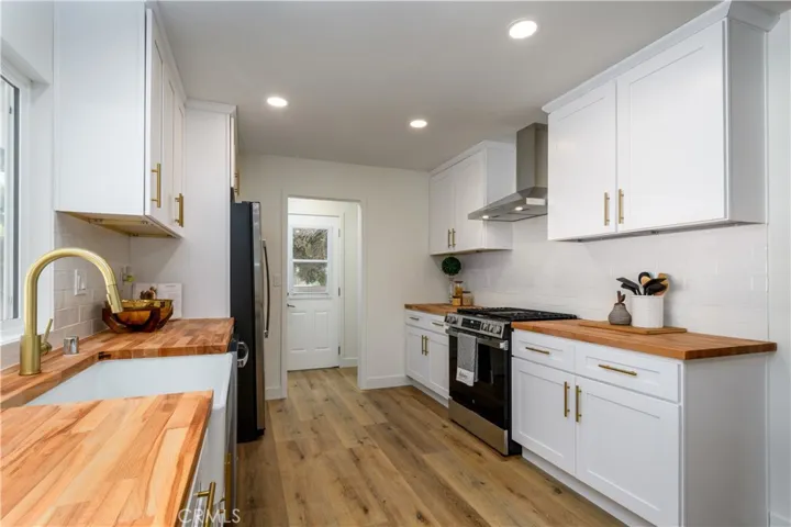 Kitchen with view to laundry room.