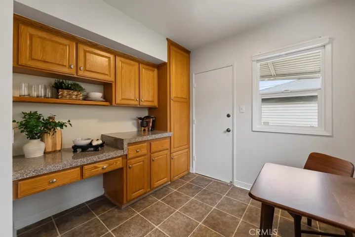 Built in desk and storage area in kitchen