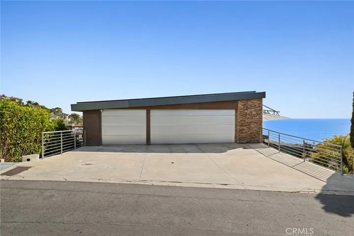 3 car garage with additional 3 parking spaces