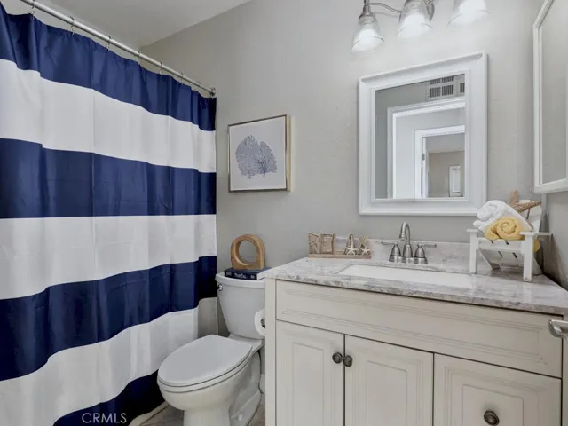 Full bath with updated vanity