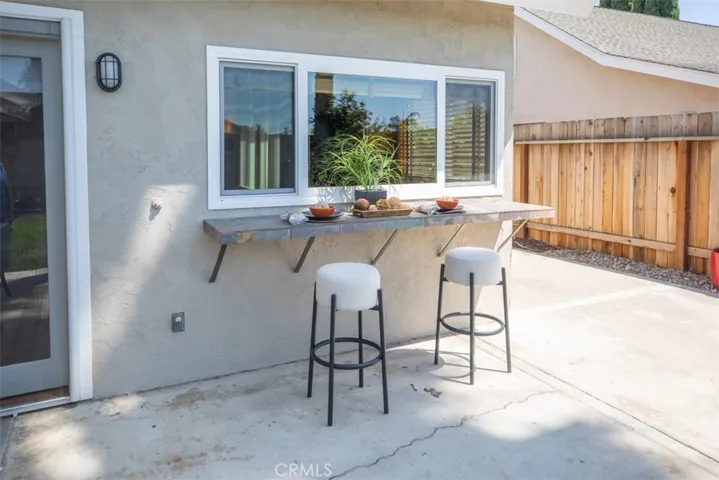 Outdoor bartop with pass through window.