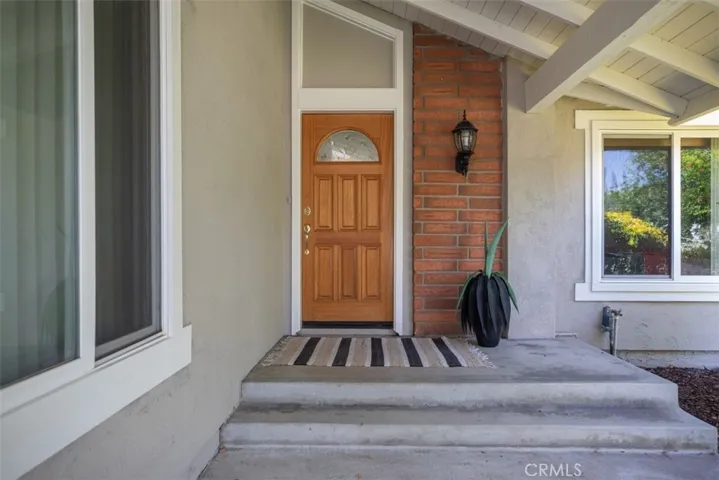 Covered front door entry.