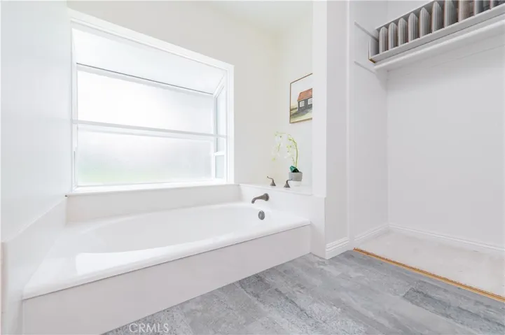 Large soaking tub in master bathroom