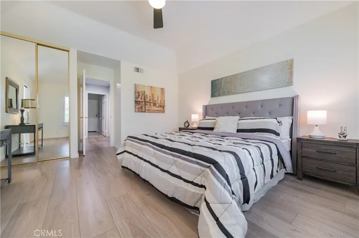 Master suite features 2 mirrored wardrobes