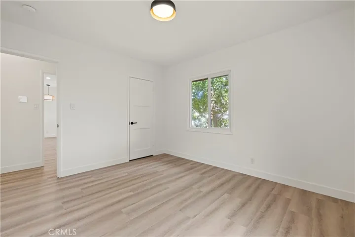 Bedroom 1 with small walk in closet