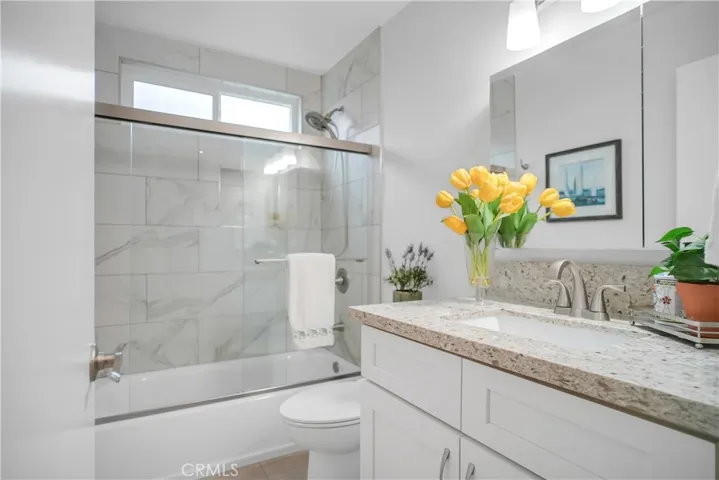Two Remodeled Bathrooms