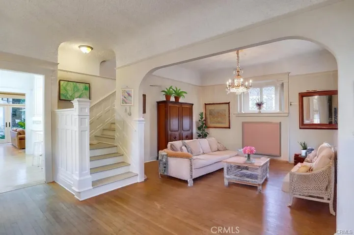 Virtually staged entry and living room