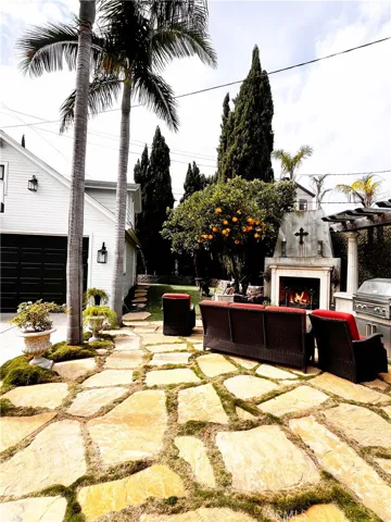 Large private backyard with built in BBQ, Fireplace/ Sink. Private