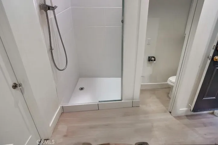 POSSIBLE shower can be added to garage bathroom/ this is a RENDERING of a example. Currently No shower installed.