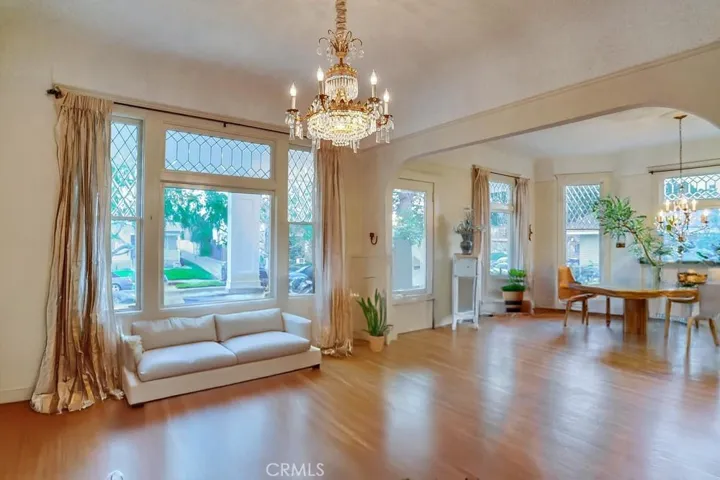 Virtually empty view of Front formal living room to Parlor/ Dining area