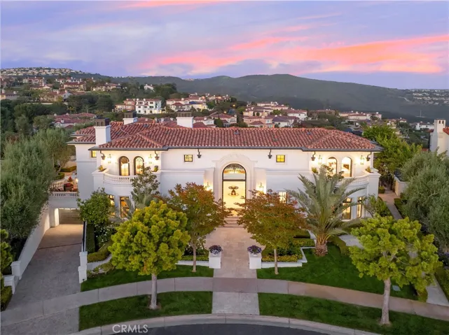 Drone Twilight at front 28 Shoreridge Legacy Estate with Curated Gardens.