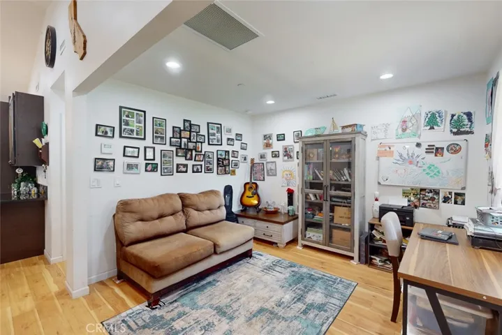 Office/den open to living area or if you entertain make it a formal dining space!