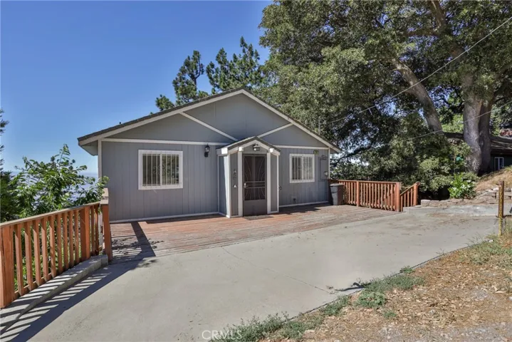 Front of house with parking