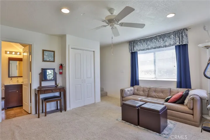 Family room with view into bathroom