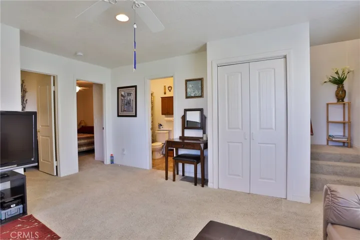 Family room with views into bedrooms and bathroom