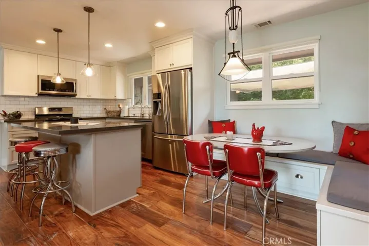 Eat in the kitchen at the adorable built-in banquet