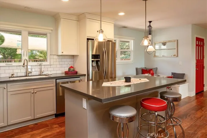 Beautifully remodeled kitchen provides the ever so popular open concept living area