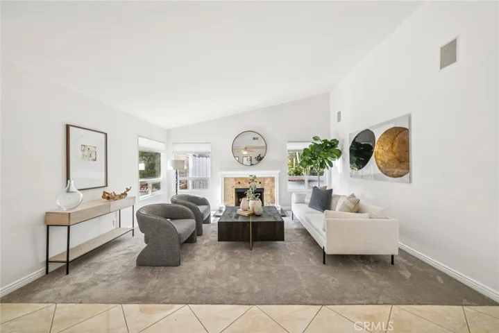 As you step inside, you're greeted by an open and airy floor plan