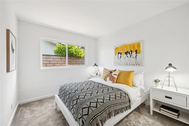 Additional, well-sized bedrooms share a beautifully designed full bathroom