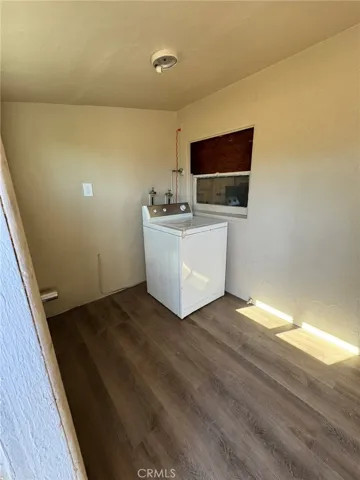 Storage and laundry area attached to Unit B