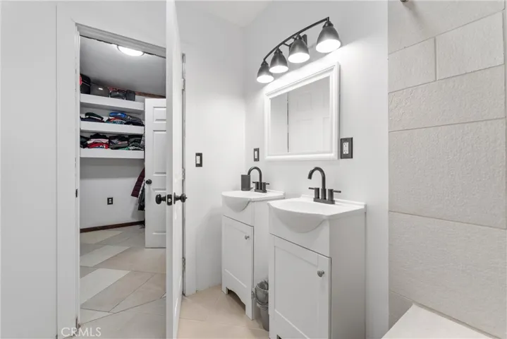Primary Bath and walk in closet.