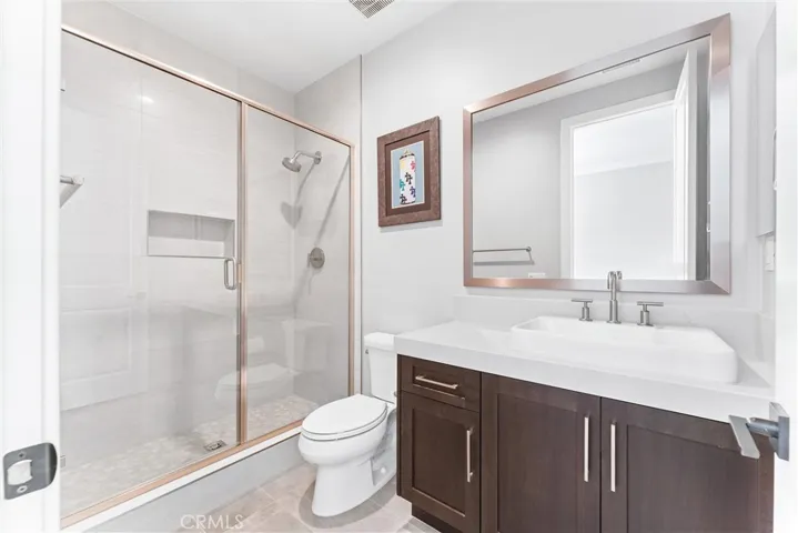The private bath in the parent's suite
