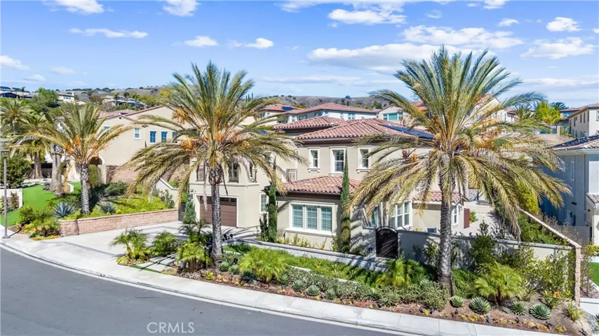 A very wide frontage with exceptional landscaping. You can use the side gate for backyard party's entry.