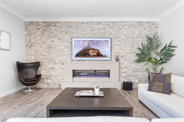 A remote controlled  fireplace with LED lights.