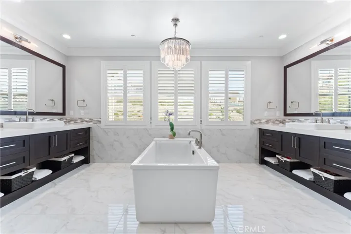 Luxurious bath in primary suite.