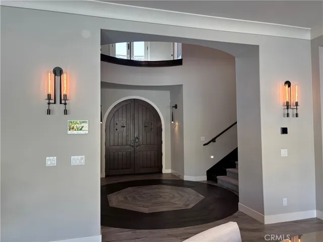All light fixtures inside are by RH.