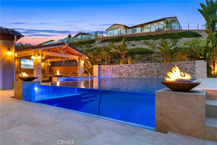 Glass infinity saltwater pool & spa.