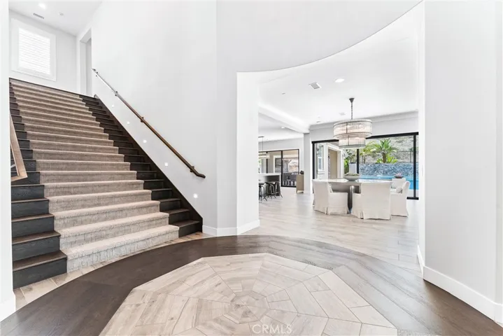 A grand foyer and staircase.