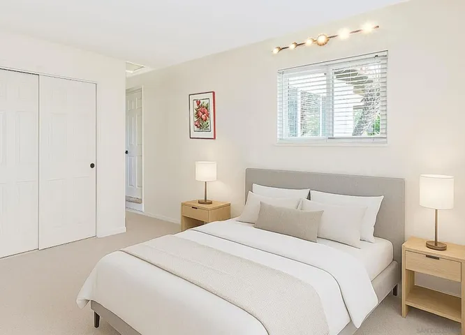 This is a rendering of the 4th bdrm & is NOT a photo of current state. Intended to help buyers visualize this room if the washer & dryer were moved to the existing garage laundry hookups. This is an approximation of queen bed, night stands & closet doors