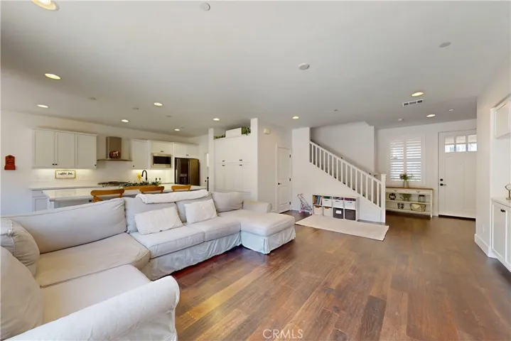 Vinyl floors and plantation shutters displayed throughout the first level.