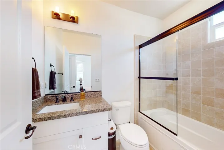 Ensuite bathroom connected to Upstairs Bedroom #3.