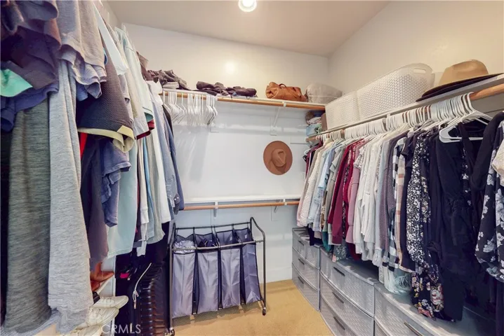 Walk-in closet attached to the primary bathroom.