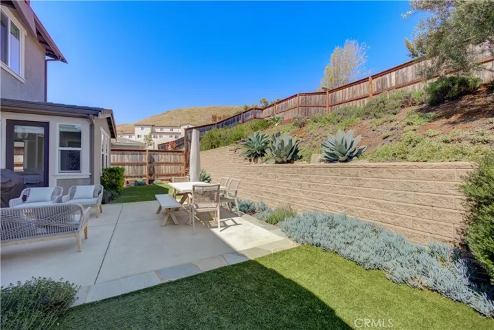 The backyard layout offers the perfect balance of privacy and scenic views.