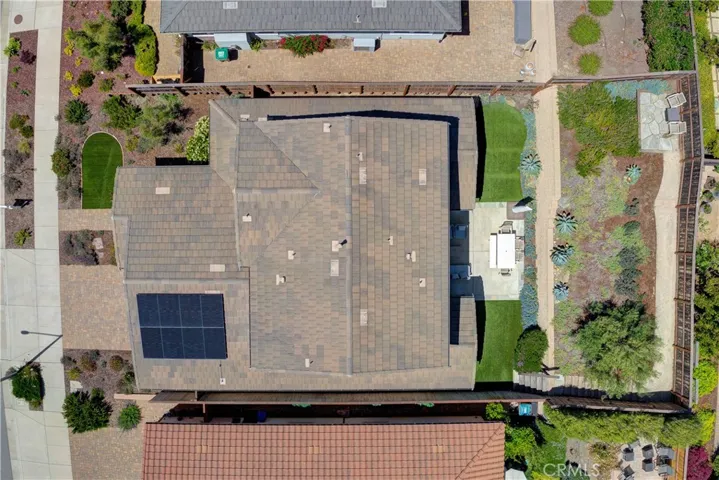 Top view featuring the fully owned solar and spacious lot size.
