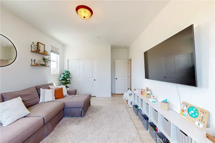 Upstairs Bedroom 1 includes a sliding door closet for convenient hide-away storage.