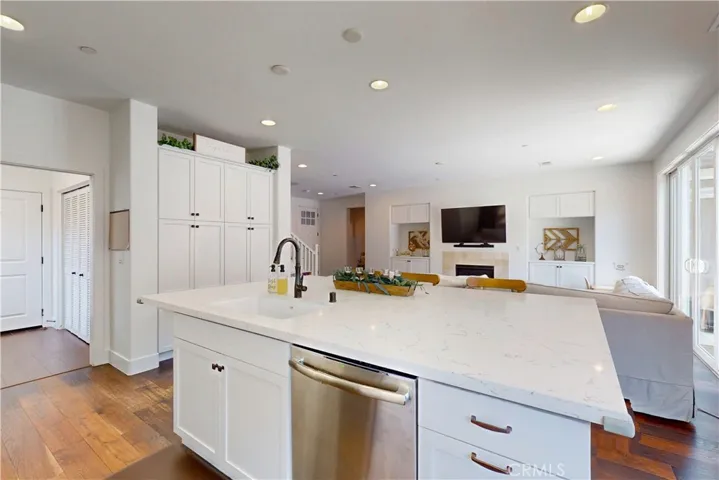 Cabinetry under the oversized island providing additional storage.