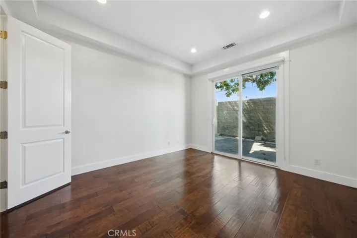 2nd Br on 1st level with walk in closet and access to Jack & Jill bath and private rear yard.