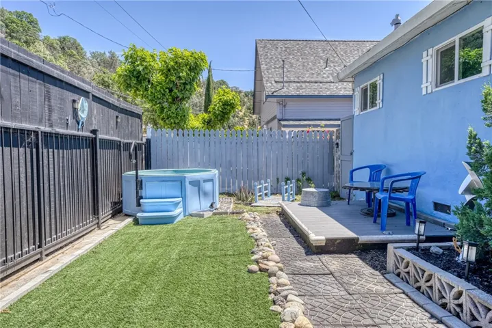 Hot tub and front yard patio