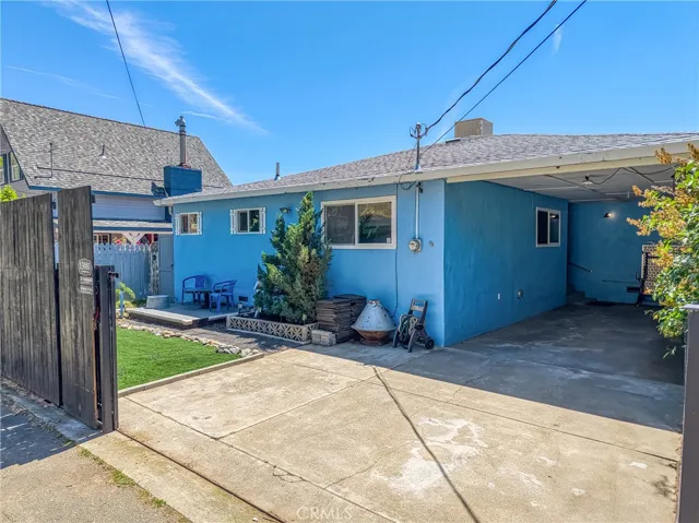 Pull-through gate leads to carport